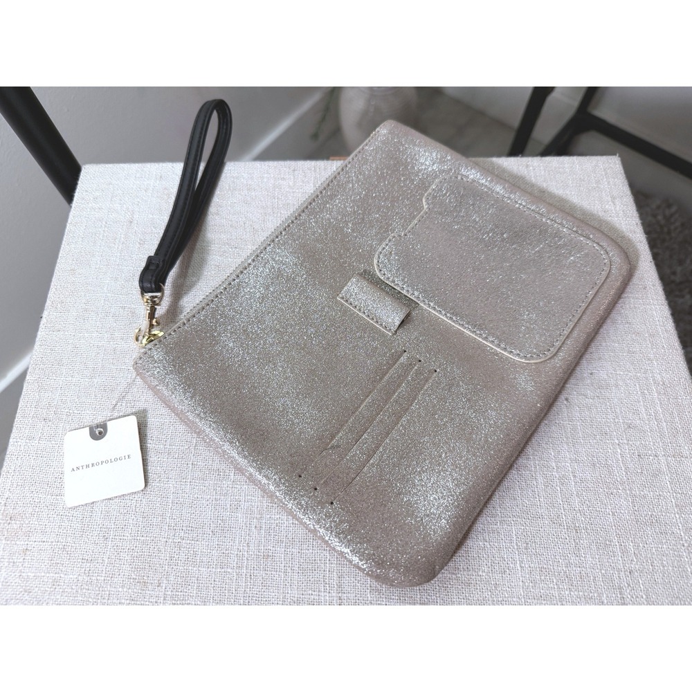Anthropologie metallic silver wristlet wallet chic streamlined day to night NWT